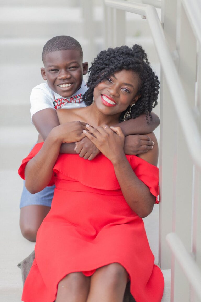 photo of boy hugging his mom